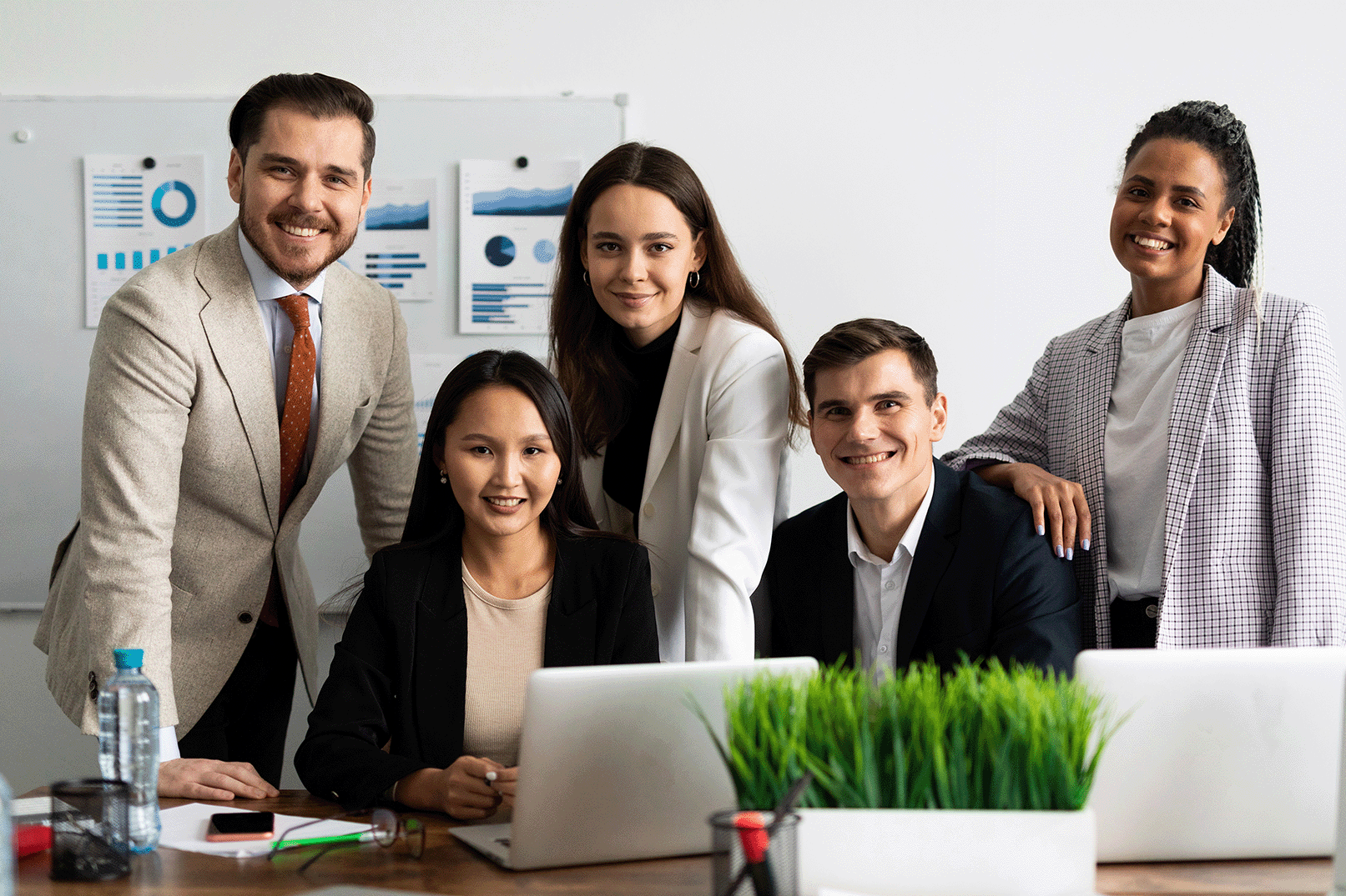 small team-of-young-business-people-smiling-looking-at-c-2023-02-03-00-18-20-utc-1